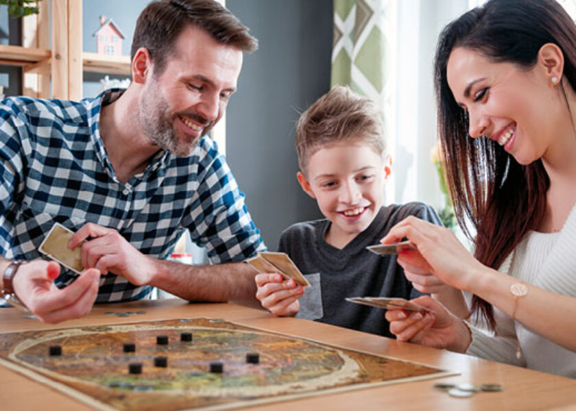 family-playing-board-game